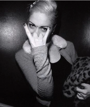 Gwen rocking the horns. Gwen rocking the horns.
