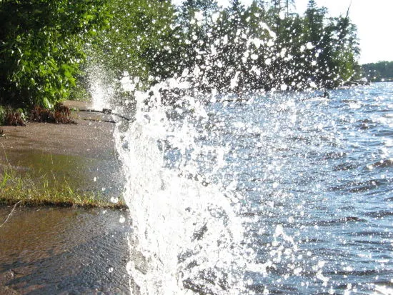 Waves crashing on the retaining wall at Round Lake… Waves crashing on the retaining wall at Round Lake…