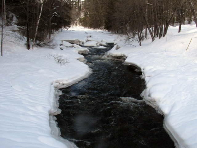 Winter stream in Wakefield, Quebec Winter stream in Wakefield, Quebec