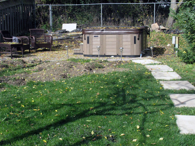 Backyard with the new hot tub!